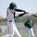 Huron catcher Joe Cleary makes contact with a ball in the game against Pioneer on Monday, May 13. Daniel Brenner I AnnArbor.com